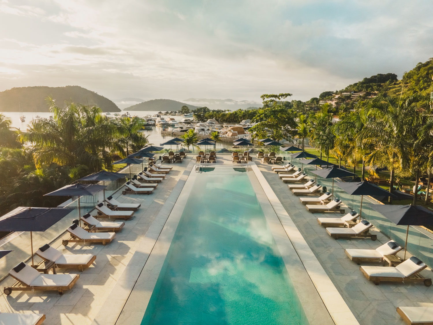 Poolside seating area at Hotel Fasano Angra dos Reis
