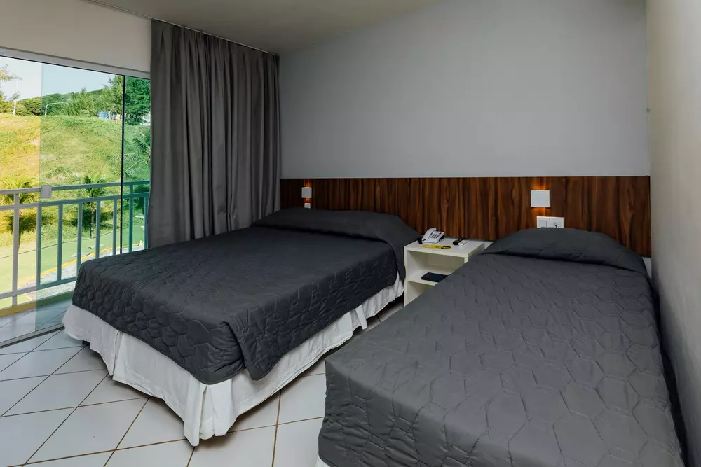 Twin bedroom with balcony at El Aram Natal Mar